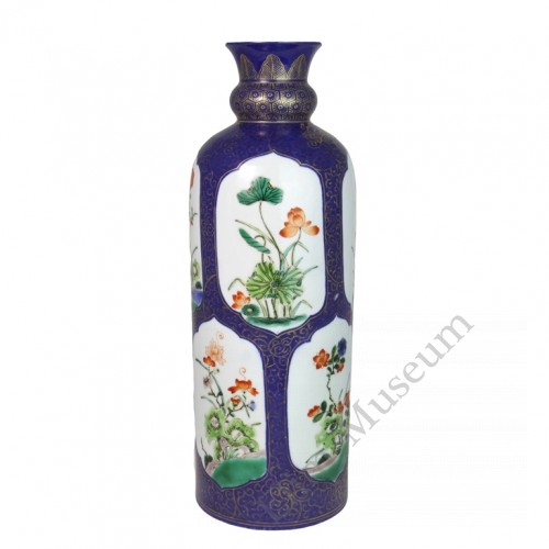 1030   A Wucai powder-blue vase of four seasons flowers 